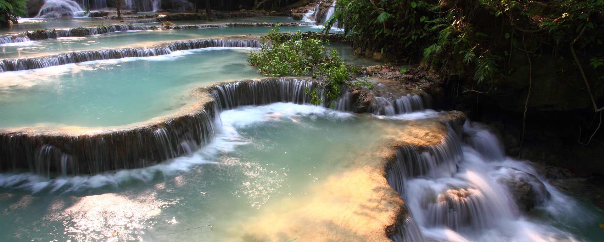 Visit Kuang Si Waterfalls  