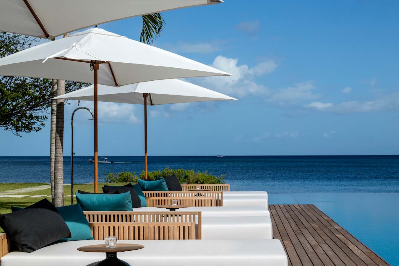 Beachfront Villa chaise longues on the deck