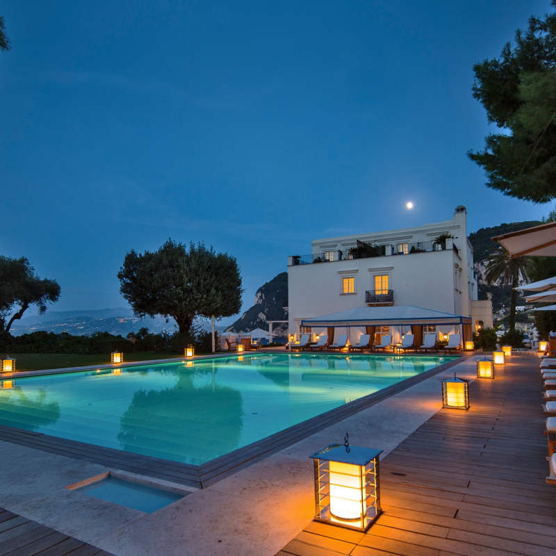 Pool at night - JK Place Capri