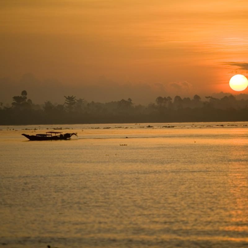 Sunset over the Mekong - Bassac Boat 