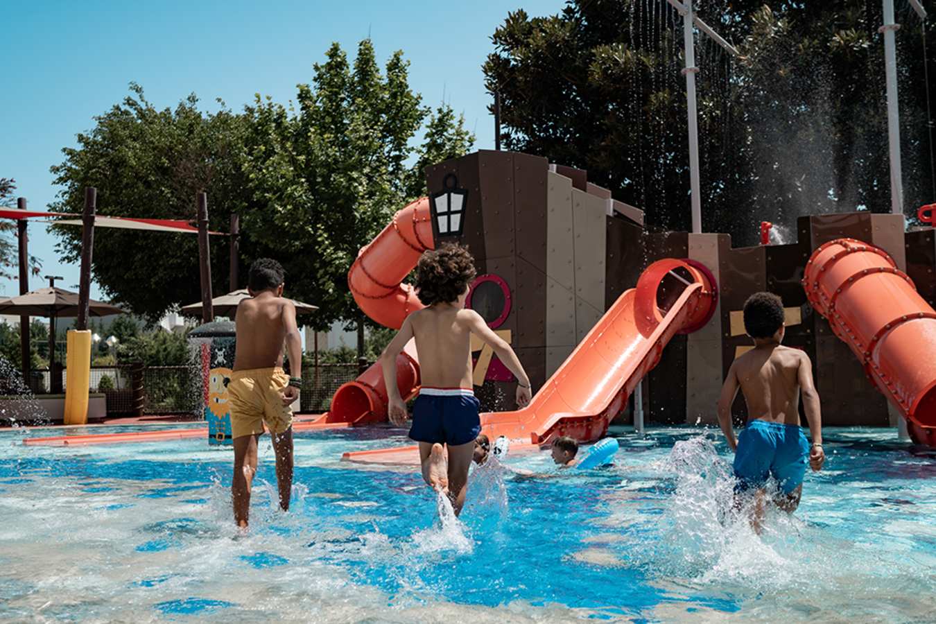 Kids in paddle pool 