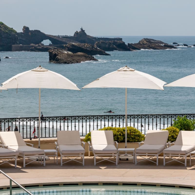 Sunlounges by the swimming pool 
