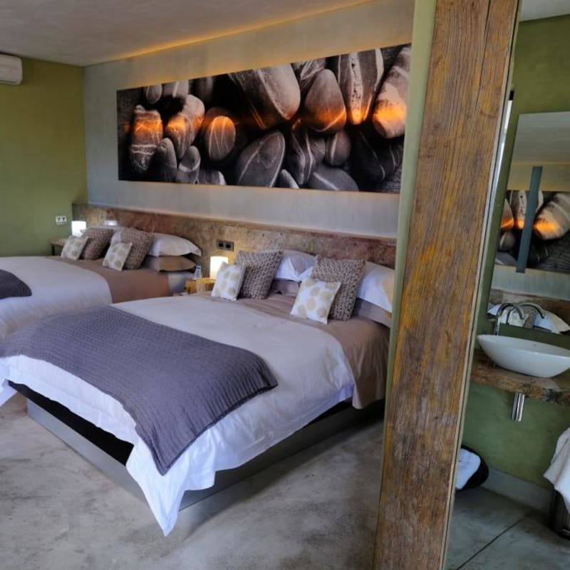 Garden Suite bedroom and bathroom - Olive Grove