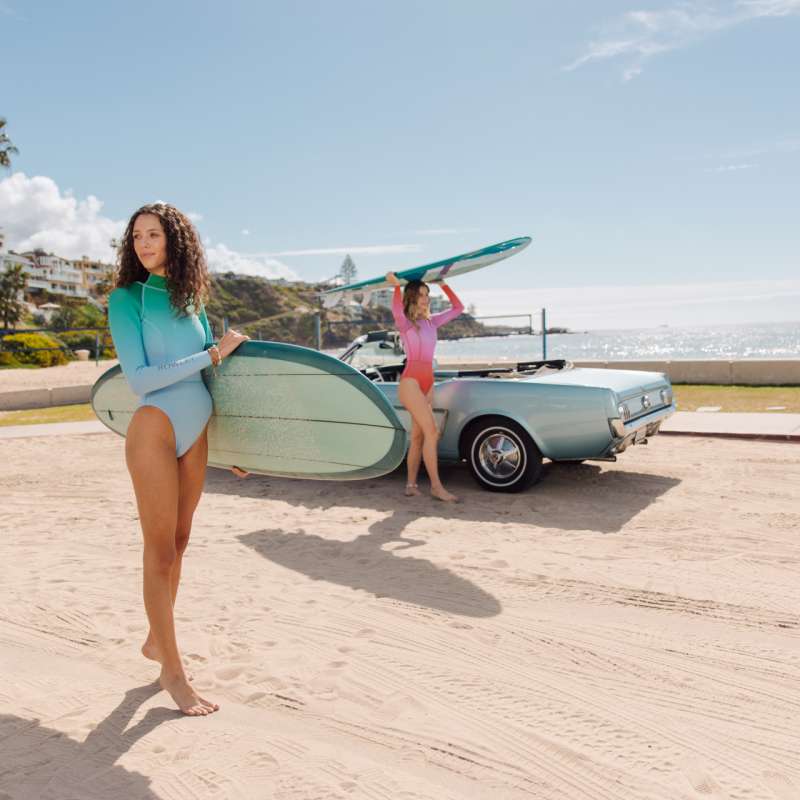 Women with surfboards in Newport Beach 