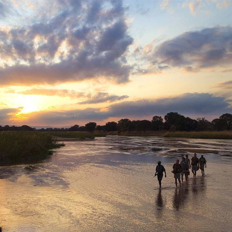 Walking across the Mupamadzi River - Walk Zambia