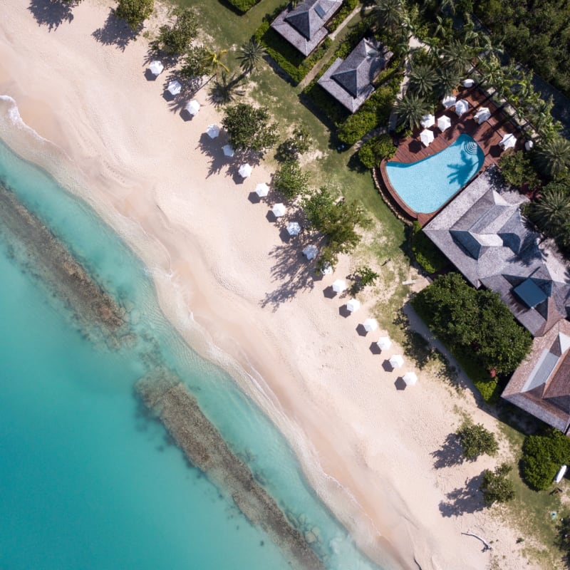 Beach and Reef aerial Hermitage Bay
