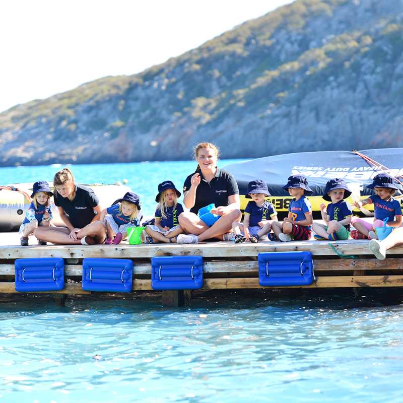 Children on a dock for Explorers Kids Club 