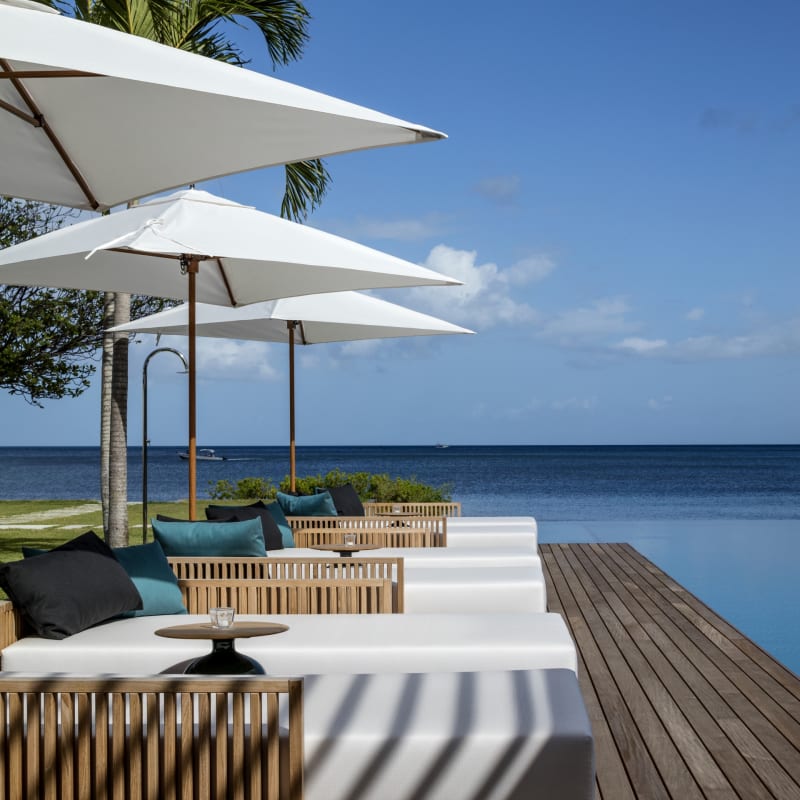 Beachfront Villa chaise longues on the deck